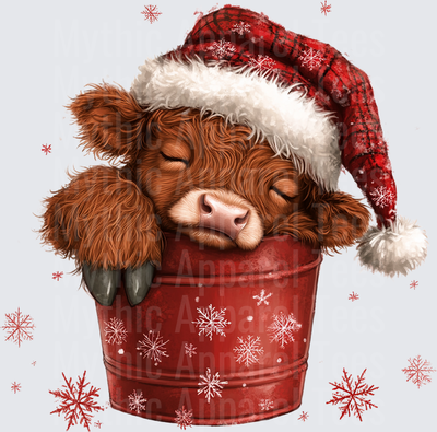 Highland Christmas Cow Sleeping in Red Bucket Santa Hat