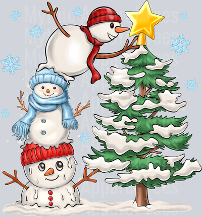 Snow Christmas Tree putting on star topper